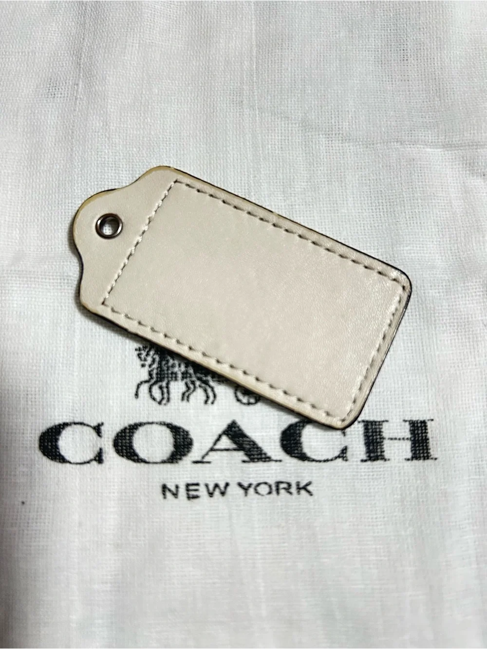 Coach Leather Bag Tags in Cream and Tan